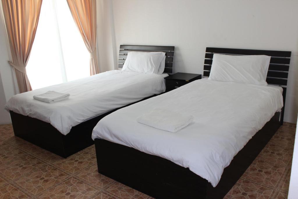 Samal Guesthouse Pattaya Rum bild